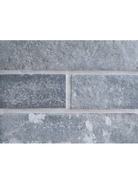 grey brick chamber close up